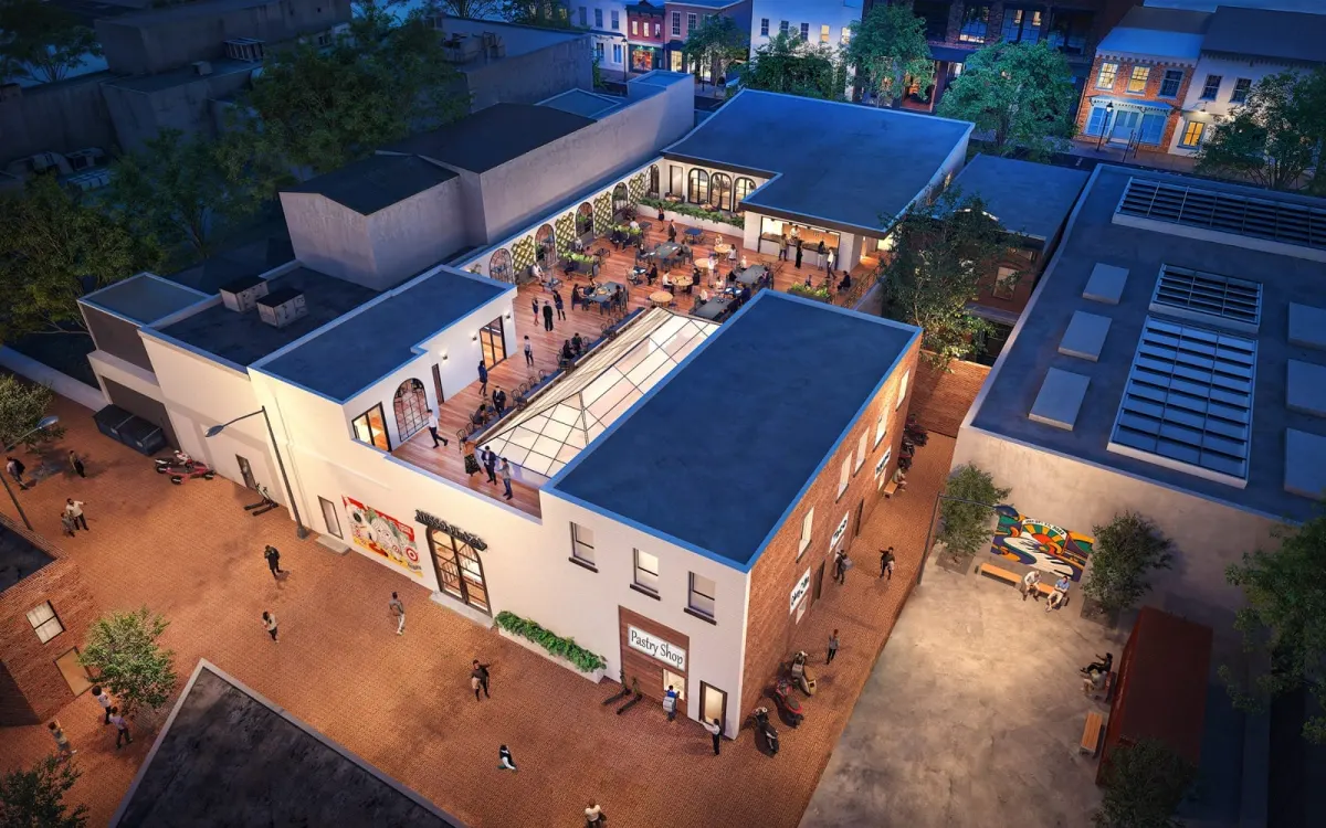 3D aerial rendering of Nesso Plaza at dusk, modeled from the architectural plans — rooftop terrace, skylight, and murals