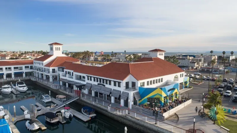 The chapter mixer venue from the air: a brewery on the harbor with the patio full