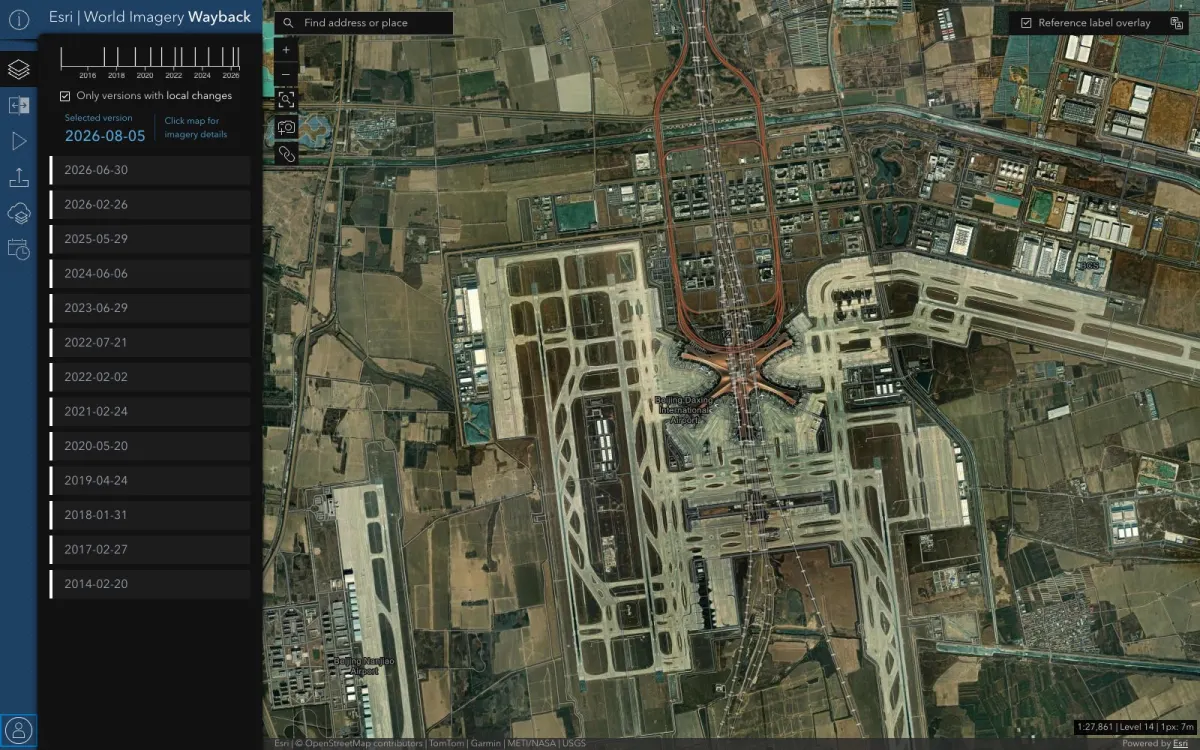 World Imagery Wayback app — a timeline of imagery versions from 2014 to 2026 alongside satellite imagery of Beijing Daxing International Airport